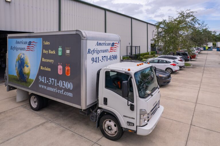 American Refrigerants delivery truck parked at warehouse ready for local distribution route.